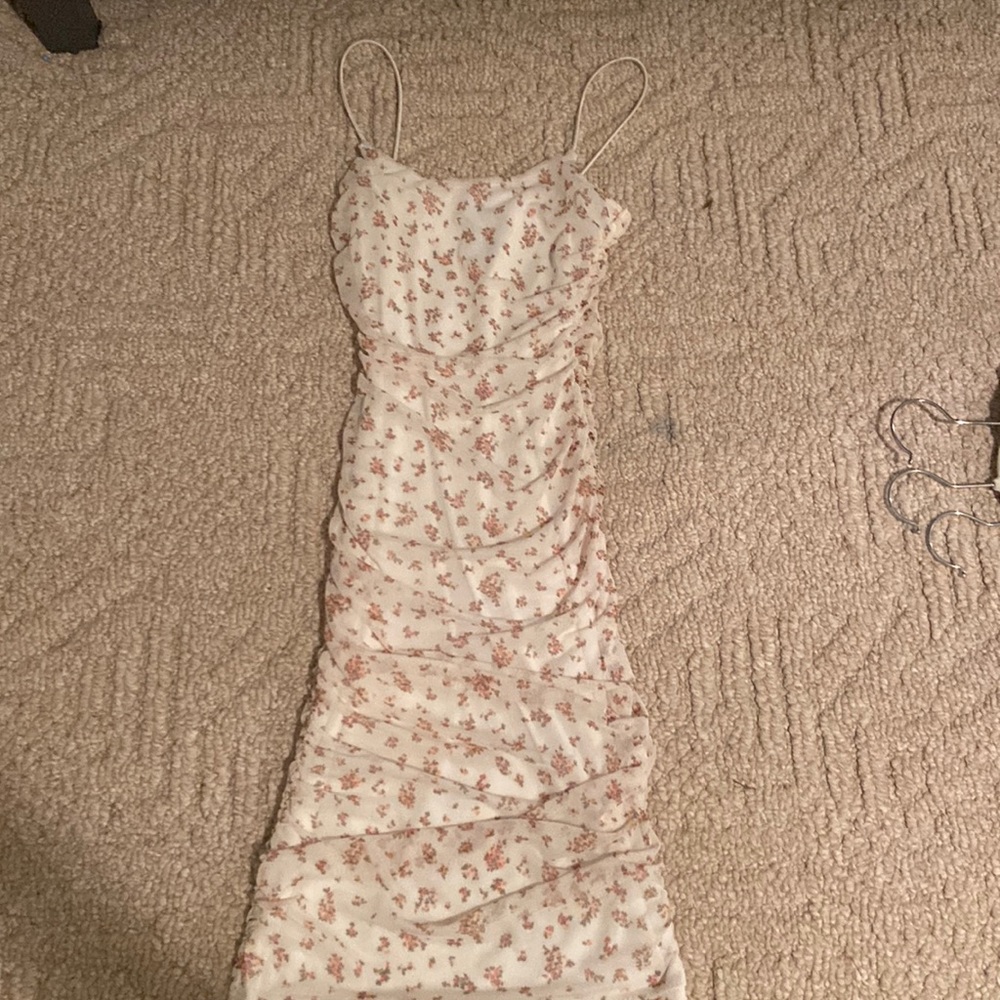 Bodycon white dress with small flowers on it